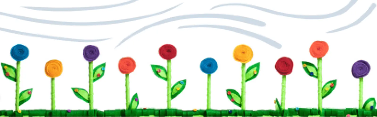 Flowers made of felt with the wind blowing above them