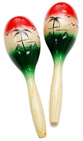 A pair of red, tan, and green maracas with mountains, palm trees, and flying birds silhouettes